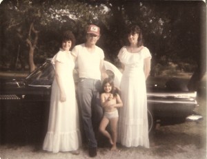 Roger Guinther with Tracye, Mandy and Jolene in front of his 57 T-Bird.