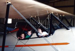 Katrina, Storm and Jackson hanging out in one of Poppy's planes.