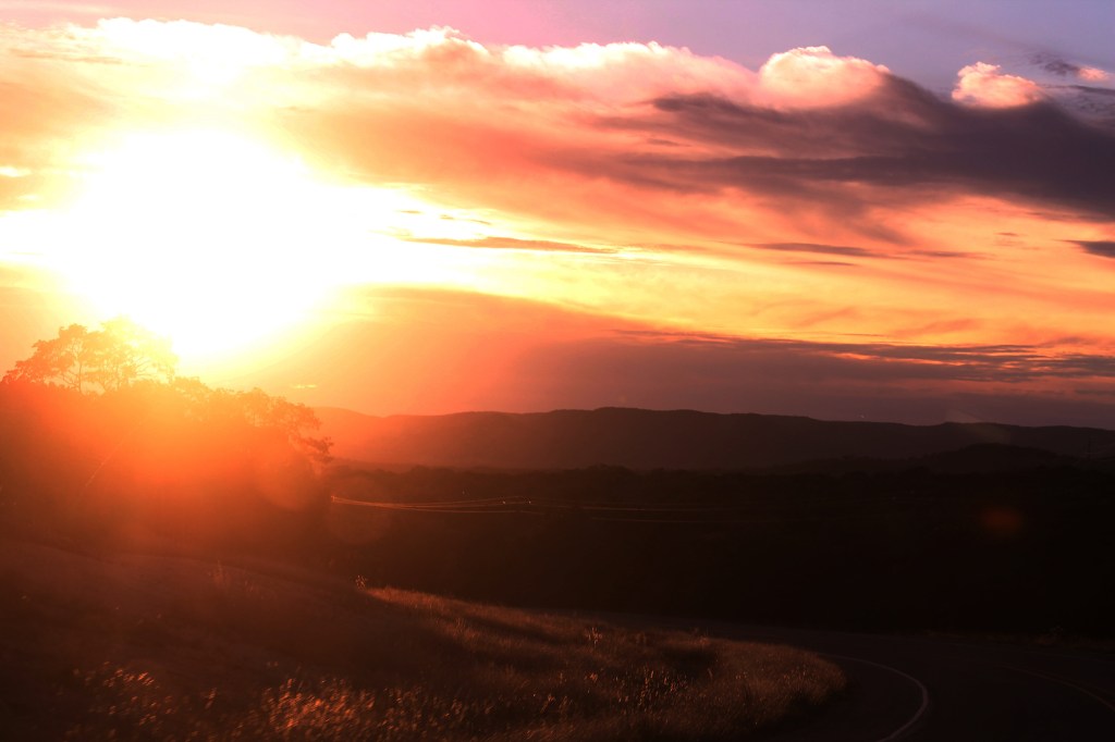 Sunset over Texas Hill Country on the road to Leakey Texas from Bandrea Texas