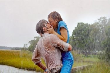 Kissing in the rain including clingy white shirt in Notebook