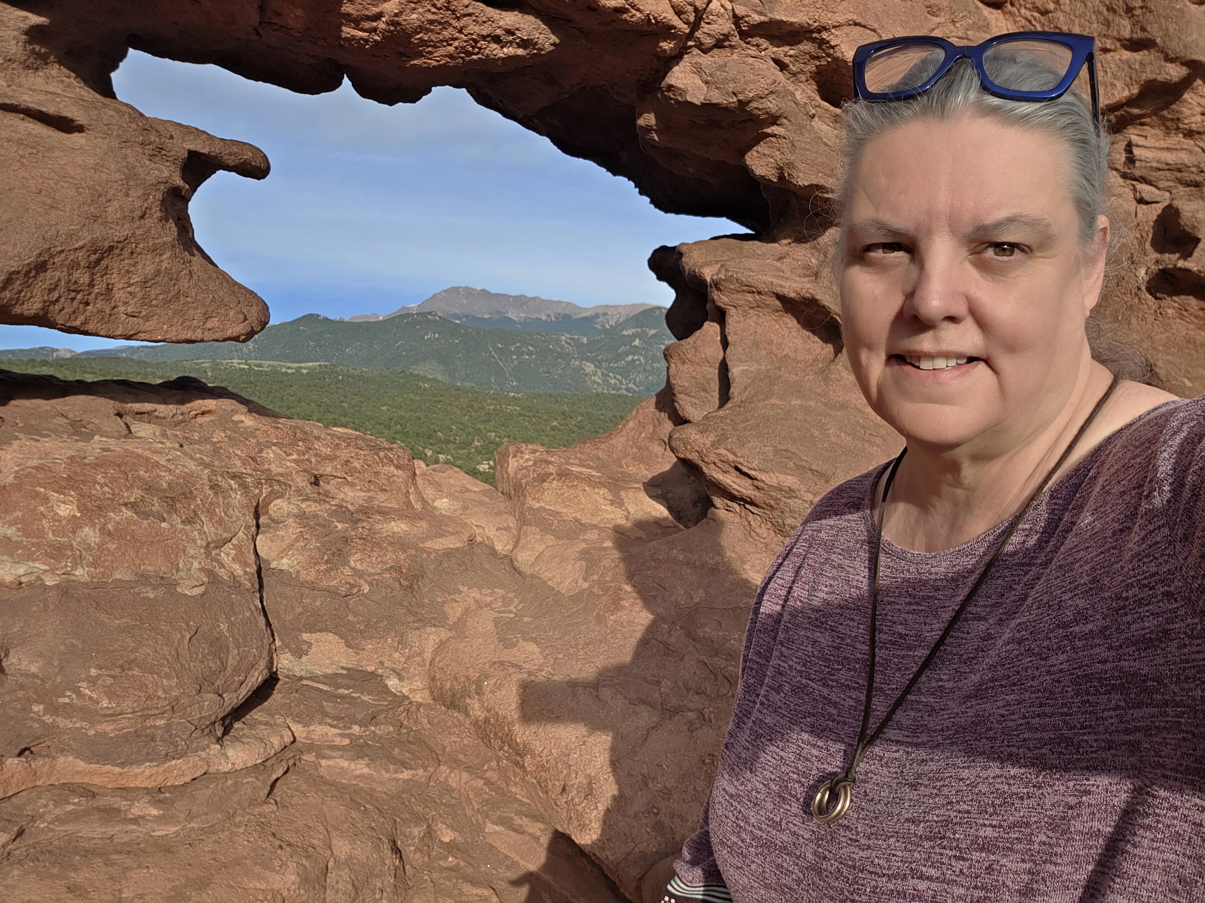 Photo of Garden of the Gods. Photo taken by Jolene Navarro. Trail up to the Siamese Twins Trail at the 'Window" view of Pike's Peak