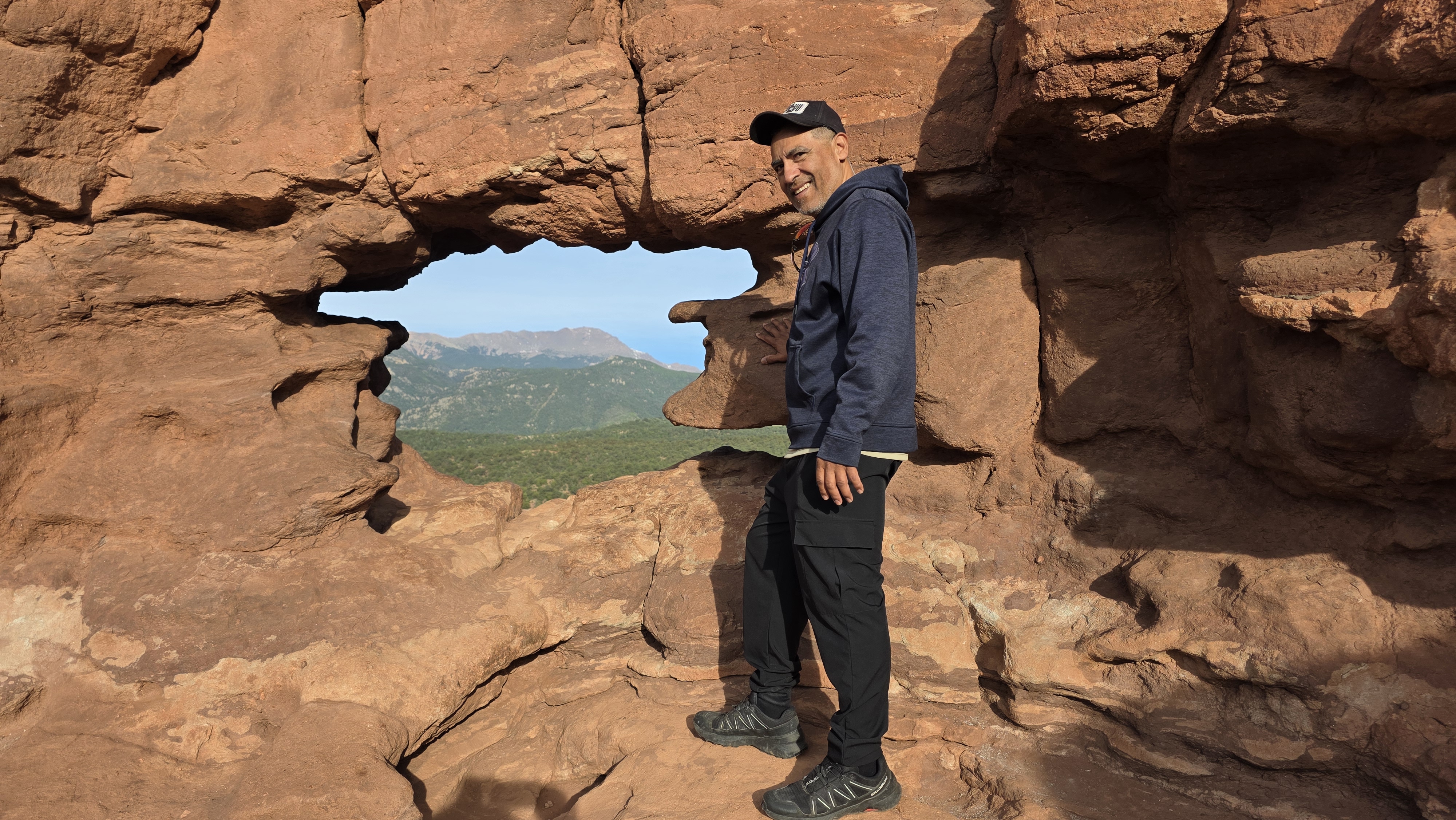 Photo of Garden of the Gods. Photo taken by Jolene Navarro. Trail up to the Siamese Twins Trail at the 'Window" view of Pike's Peak